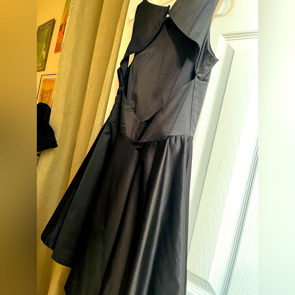 Bebe satin cocktail dress with an open back.
